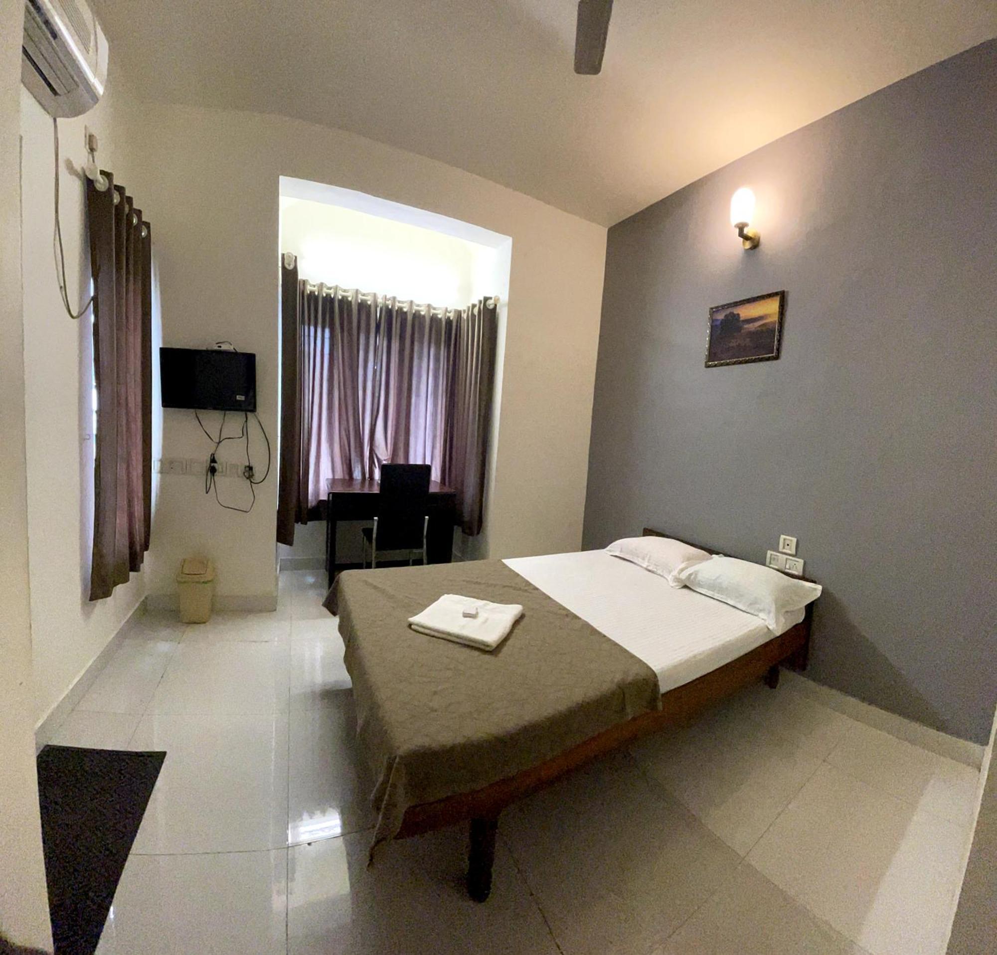Orkuz Residency Lejlighed Kochi Værelse billede