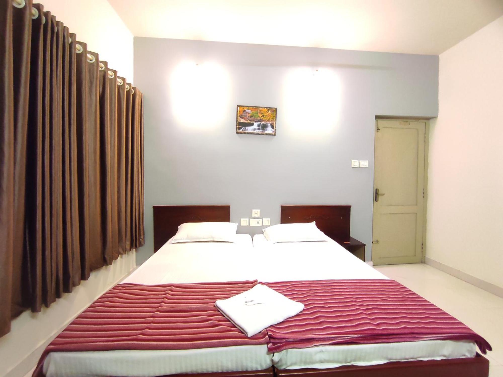 Orkuz Residency Lejlighed Kochi Værelse billede
